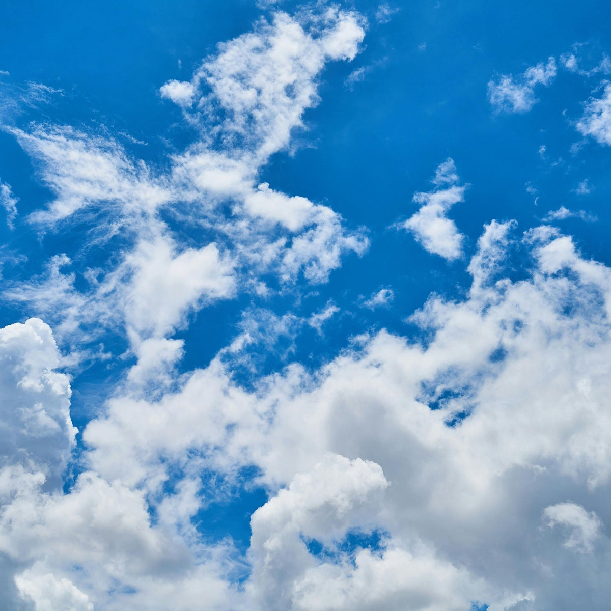 White clouds against a blue sky
